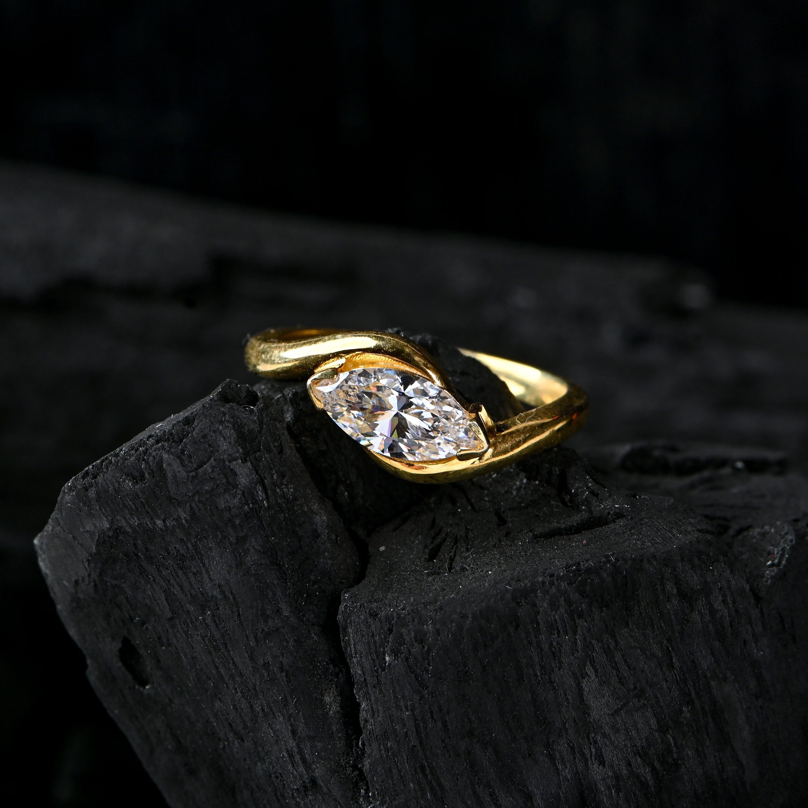 Gold-Plated Sterling Silver Ring with Marquise-Cut Cubic Zirconia – Elegant Twist Design