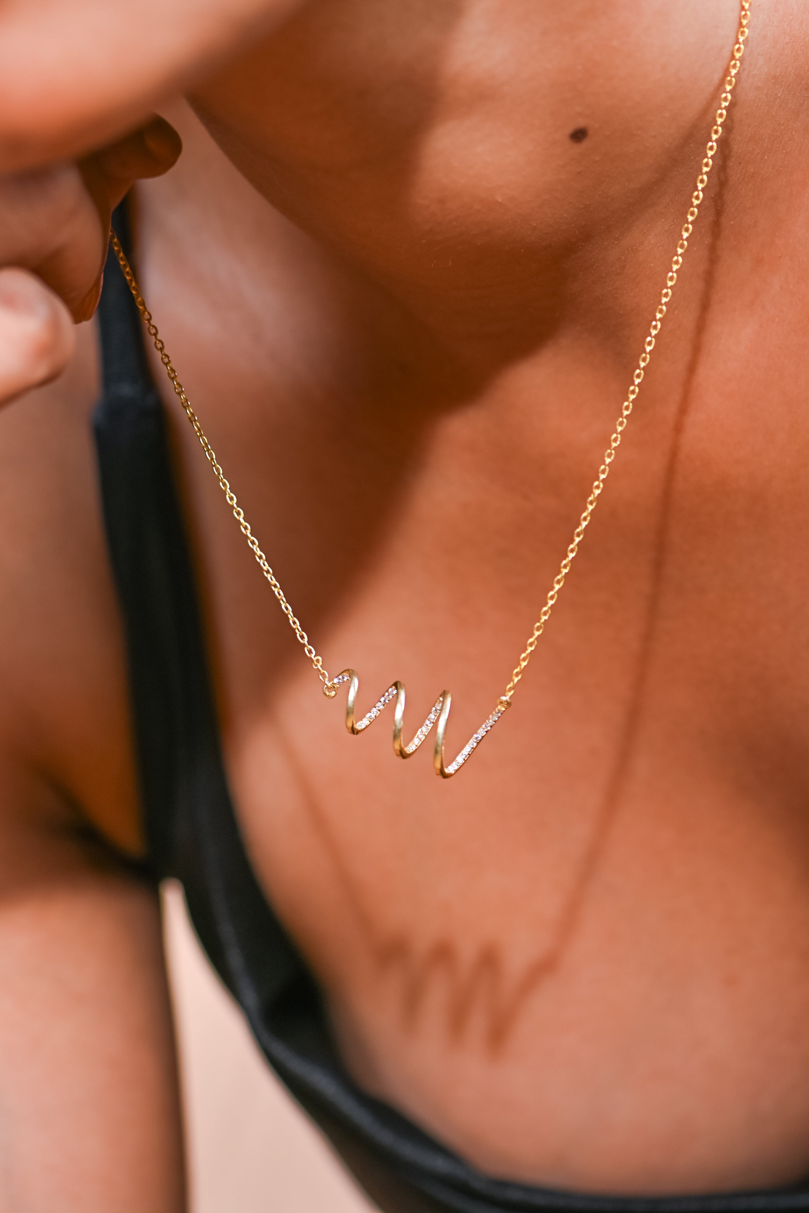 Gold-Plated Silver Wave Pendant Necklace with Moissanite Accents