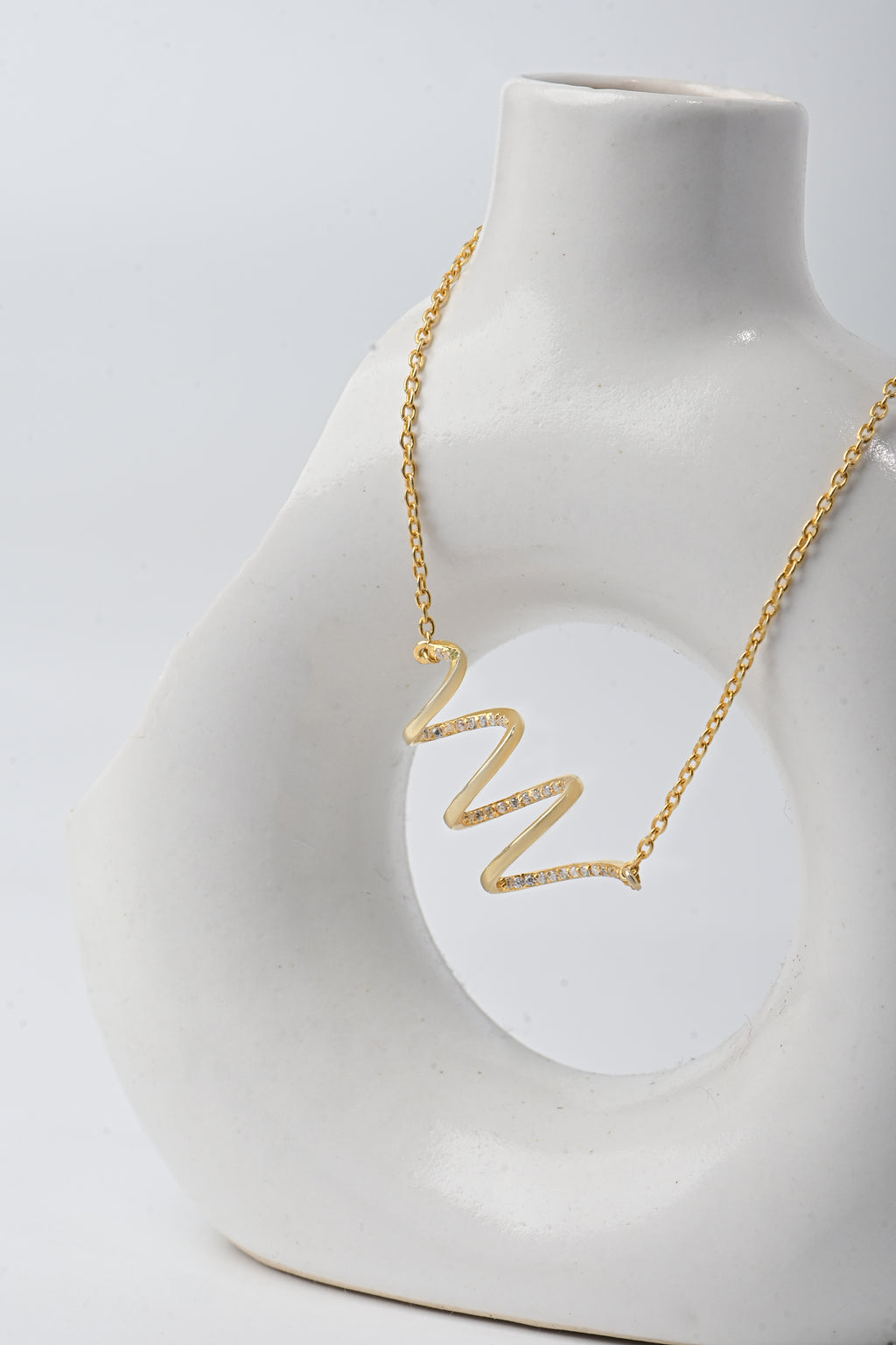 Gold-Plated Silver Wave Pendant Necklace with Moissanite Accents