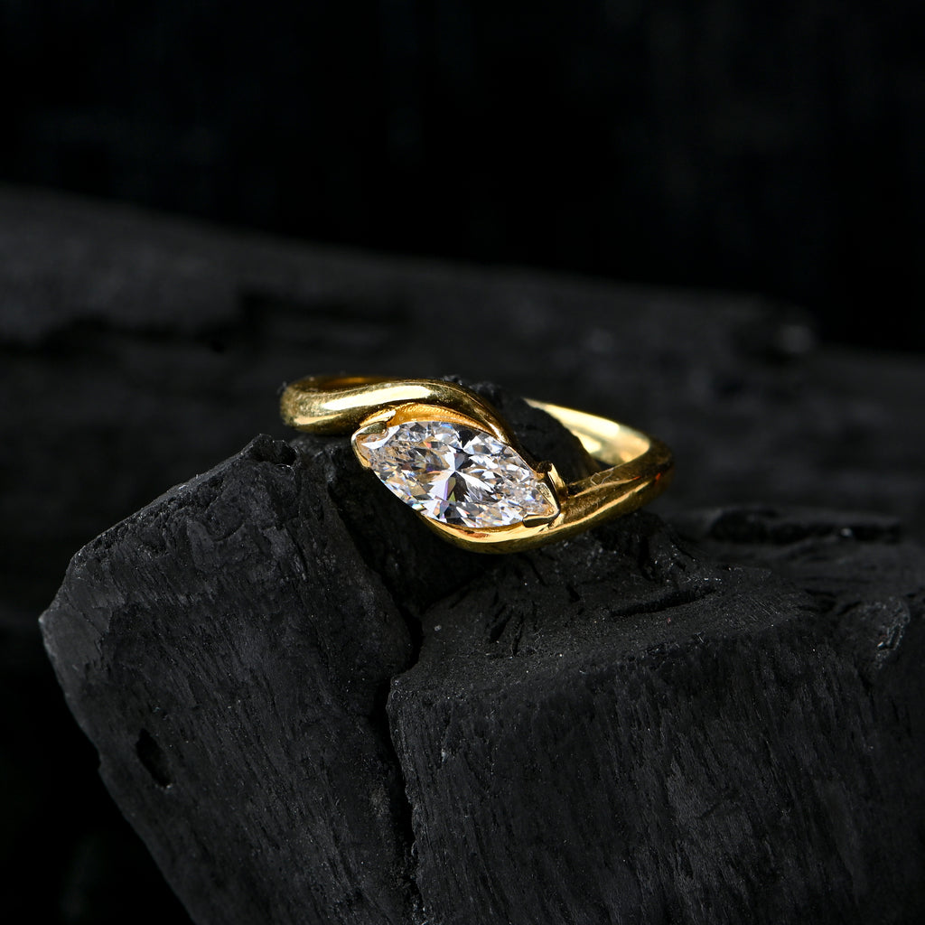Gold-Plated Sterling Silver Ring with Marquise-Cut Cubic Zirconia – Elegant Twist Design