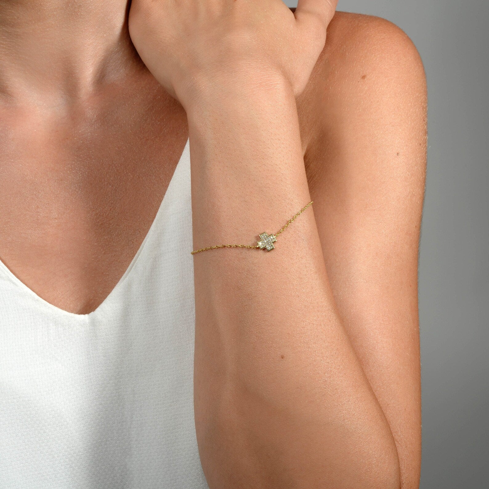Solid Gold Diamond Cross Bracelet: Delicate Religious Jewelry